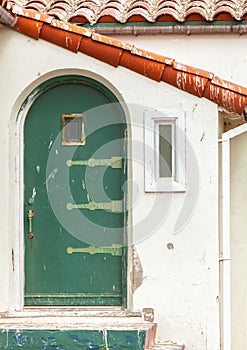 Green door on a white building in Anacapa Island, Channel Islands National Park, California, USA