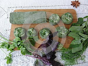 Green dough roll cooked from nettle and wild plants