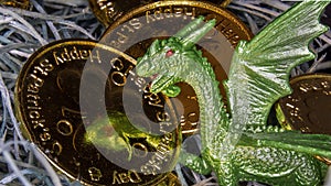 Green dragon with reflective gold coins