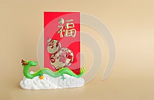The green dragon statue and red envelope on light brown background. 2024 New Year.translate Chinese alphabets Fu on red envelope