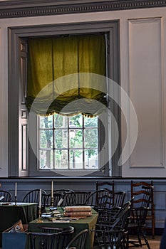 Green drape hanging in a window in the Assemble Room of Independence Hall