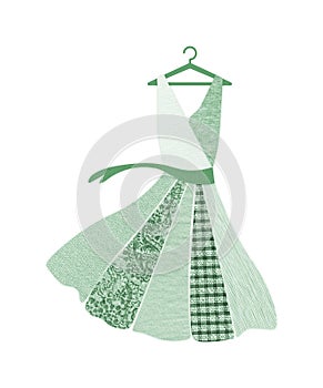 Green dress on hanger made with recycled fabric textures. Sustainable fashion