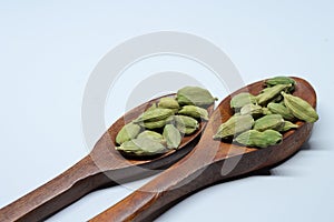 Green Dried cardamom seeds isolated on white background