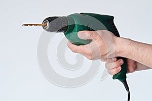 Green drill in hand