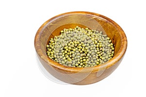 Green dry beans in wooden bowl