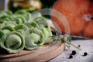 Green dumplings with salmon