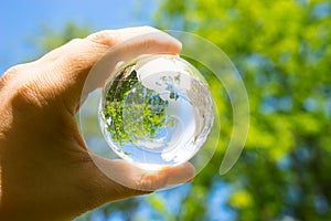 Green & Eco environment, glass globe in the garden