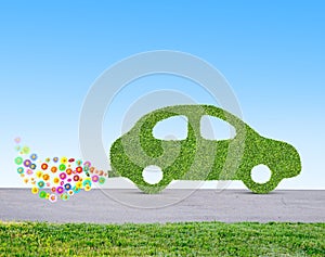 Green eco friendly car concept made of grass