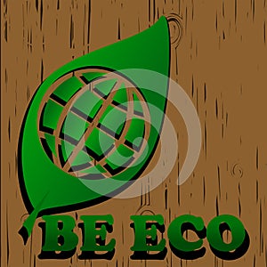 green eco world symbol on wood backgroung
