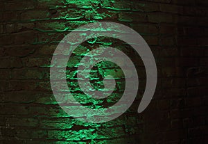 Green Eerie light on Brick Wall