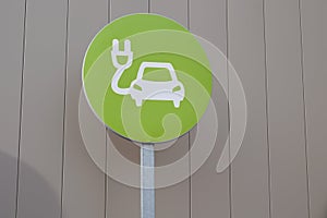 Green electric car charging station symbol vehicle sign
