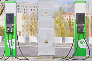 Green electric charging stations with grey power transformation station