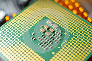 Green electronic chip CPU closeup. Concept of high technology and repair microchip