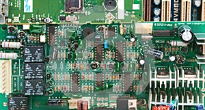 A green electronic circuit board background