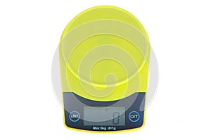 Green electronic digital kitchen scale on white