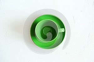 Green empty cup, isolated. View above