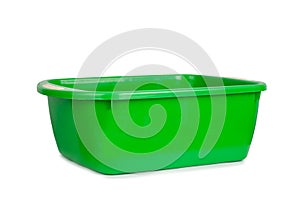 Green empty plastic bowl isolated