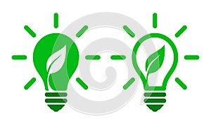 Green energy eco light bulb logo with a growing leaf. Ecological electricity concept vector icon