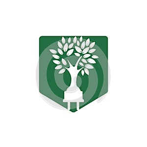 Green energy electricity logo concept. Electric plug icon with tree.