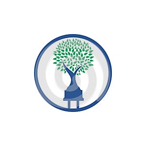 Green energy electricity logo concept. Electric plug icon with tree.