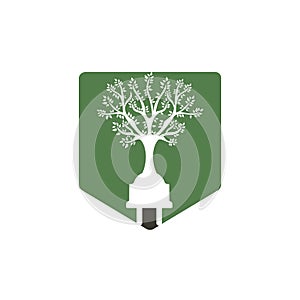 Green energy electricity logo concept. Electric plug icon with tree.