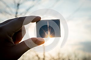 Green energy, Photovoltaic Solar Cell with hand photo