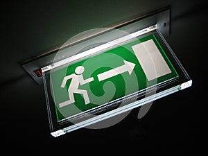 Green Exit Sign on Ceiling