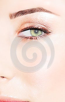 Green eye of a woman