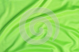 Green fabric cloth background texture close up