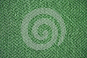 Green fabric texture. Green cloth background. Close up view of green fabric texture and background. Green cloth pattern.