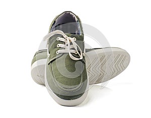 Green fashion canvas shoes on white background