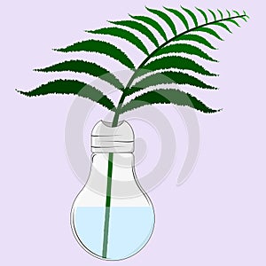 Green fern branch in a lamp-shaped vase