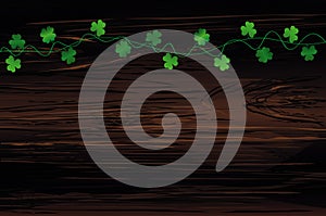 Green festive bunting with clover. Irish holiday - Happy St. Patrick`s Day with garland of three-leaf. Greeting card, poster,