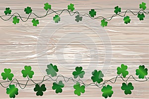 Green festive bunting with clover. Irish holiday - Happy St. Patrick`s Day with garland of three-leaf. Greeting card, poster,