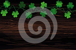 Green festive bunting with clover. Irish holiday - Happy St. Patrick`s Day with garland of three-leaf. Greeting card, poster,