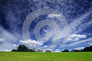 Green Field and Dramatic Sky