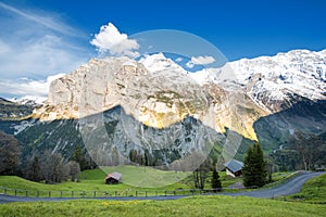 Green fields and famous stunning touristic town , Switzerland