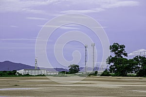 Green fields with modern factory buidling for green industry concept