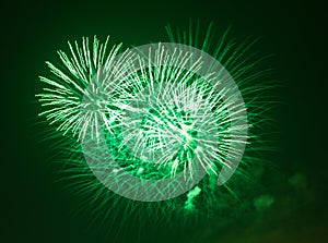 Green fireworks at night