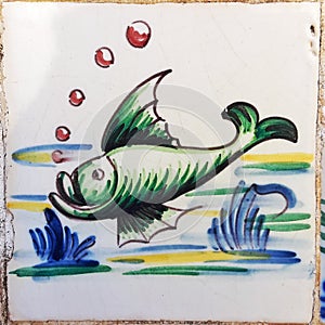 Green fish antique tile