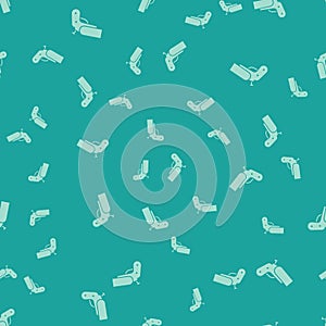 Green Flare gun pistol signal sos icon isolated seamless pattern on green background. Emergency fire shoot target smoke