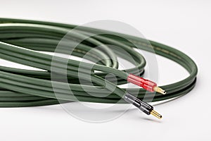 Green flexible cable for connecting electronics.