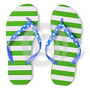 Green flip flops on white with clipping path