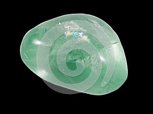 Green fluorite pebble isolated