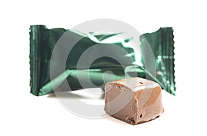 Green Foil Wrapped Chocolate Truffles on a White Background