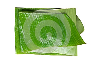 Green Folded banana leaf isolate in with background