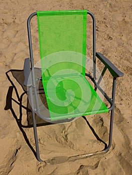 Green folding camp chair