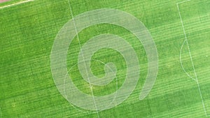 Green football field aerial view top view.