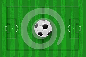 Green football field flat lay. Soccer stadium vector plan with white lines and realistic ball on center.