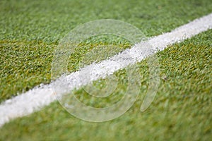 Green football field and a soccer field`s Line